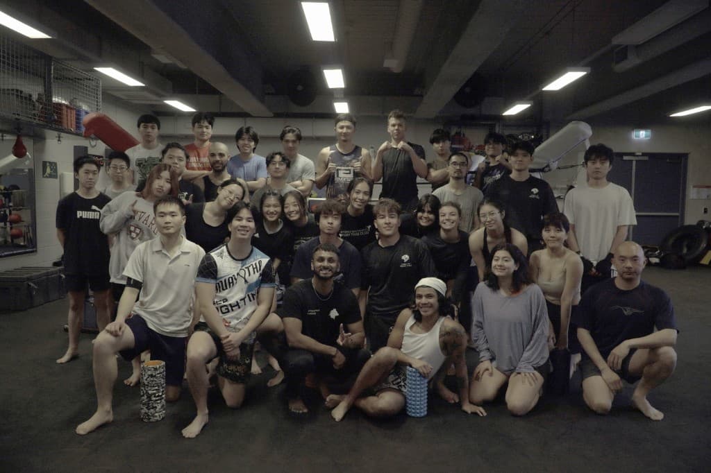 Athletes and coaches after Evolve Physio mobility and performance workshop at Sydney martial arts gym